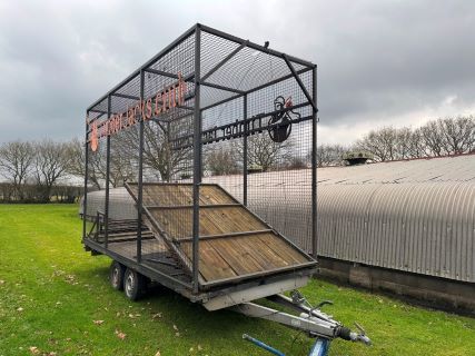 Two Converted Flat Bed Trailers Used As Axe